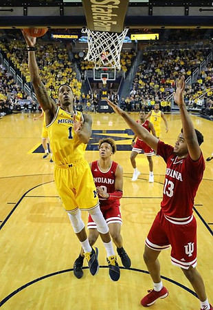 Charles Matthews (1) and Zavier Simpson (3)