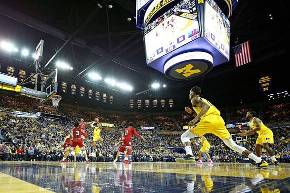 Jordan Poole (2), Charles Matthews (1), and Zavier Simpson (3)