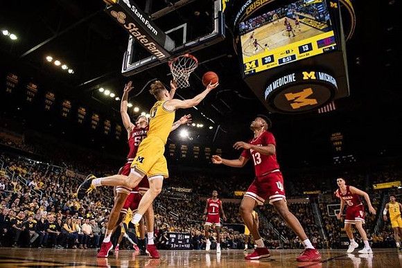 Ignas Brazdeikis (13), Eli Brooks (55), and Jordan Poole (2)