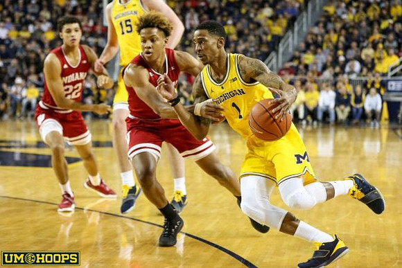 Charles Matthews (1) and Jon Teske (15)