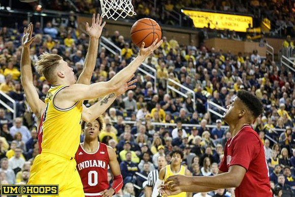 Ignas Brazdeikis (13) and Eli Brooks (55)