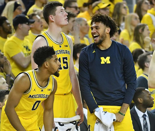 David DeJulius (0), Jon Teske (15), and Isaiah Livers (4)