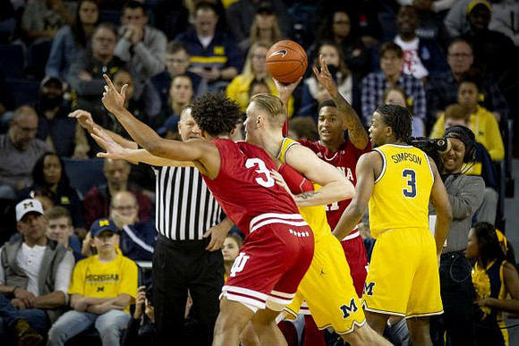 Ignas Brazdeikis (13) and Zavier Simpson (3)