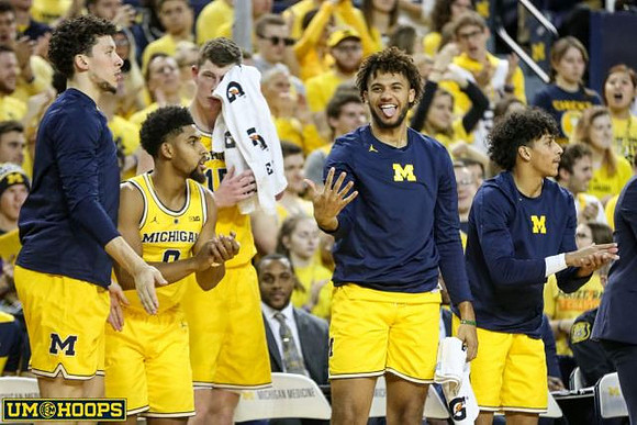 Brandon Johns Jr. (23), David DeJulius (0), Jon Teske (15), Isaiah Livers (4), and Eli Brooks (55)