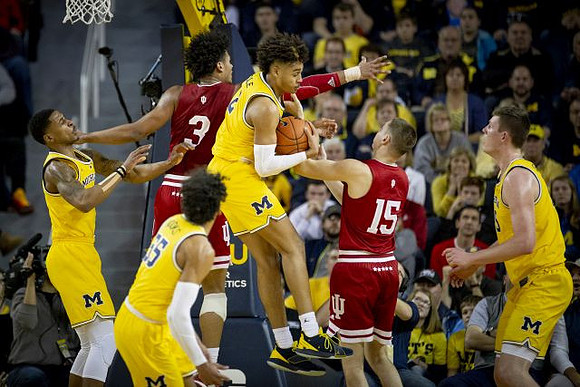 Charles Matthews (1), Eli Brooks (55), Jordan Poole (2), and Jon Teske (15)