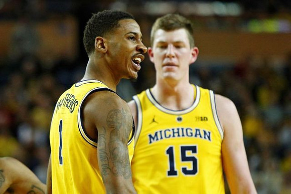 Charles Matthews (1) and Jon Teske (15)