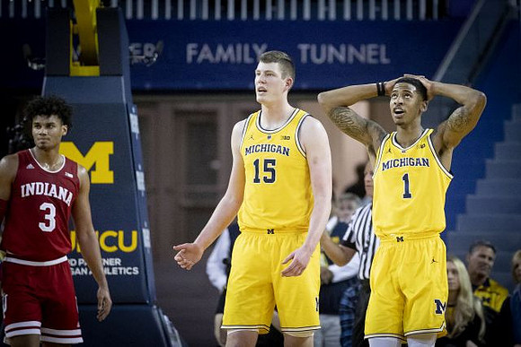 Jon Teske (15) and Charles Matthews (1)