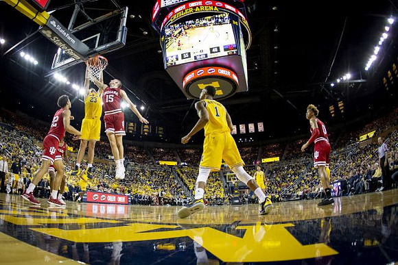 Brandon Johns Jr. (23) and Charles Matthews (1)