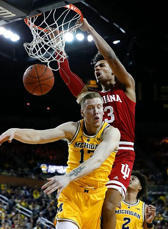Ignas Brazdeikis (13) and Jordan Poole (2)