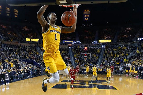 Charles Matthews (1), Ignas Brazdeikis (13), Jordan Poole (2), Austin Davis (51), and Zavier Simpson (3)
