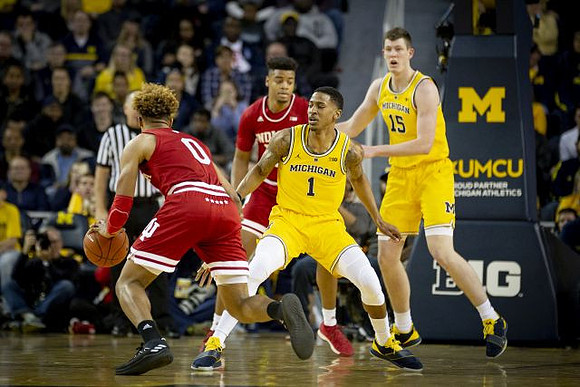 Charles Matthews (1) and Jon Teske (15)