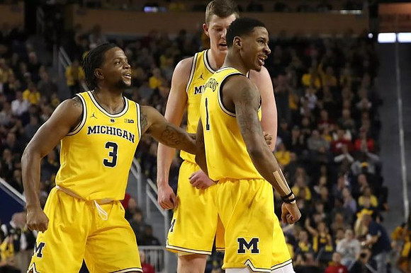 Zavier Simpson (3), Jon Teske (15), and Charles Matthews (1)