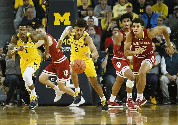 Charles Matthews (1) and Jordan Poole (2)