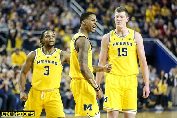 Zavier Simpson (3), Charles Matthews (1), and Jon Teske (15)