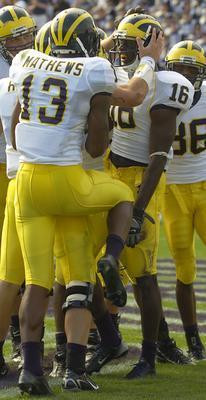 Adrian Arrington, Greg Mathews, and Mario Manningham