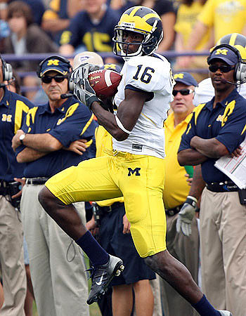 Adrian Arrington, Lloyd Carr, and Fred Jackson