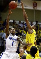Evan Smotrycz (23), Trey Burke (3), and Tim Hardaway Jr. (10)
