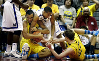 Jon Horford (15) and Evan Smotrycz (23)