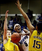 Stu Douglass (1) and Jon Horford (15)