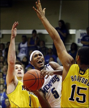 Stu Douglass (1) and Jon Horford (15)