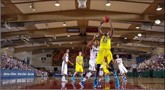 Evan Smotrycz (23), Tim Hardaway Jr. (10), and Zack Novak (0)