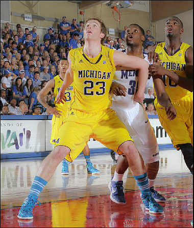 Trey Burke (3), Evan Smotrycz (23), and Tim Hardaway Jr. (10)