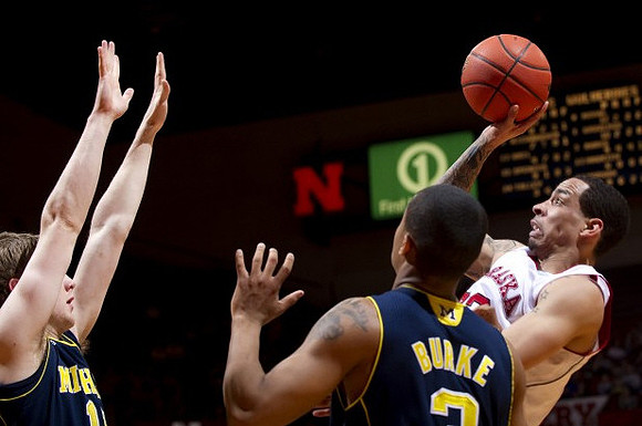Matt Vogrich (13) and Trey Burke (3)