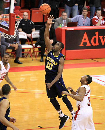 Jordan Morgan (52) and Tim Hardaway Jr. (10)