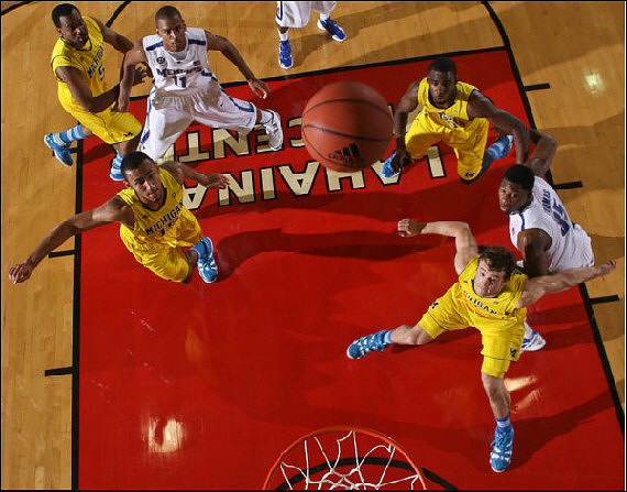 Zack Novak (0), Jon Horford (15), and Eso Akunne (5)