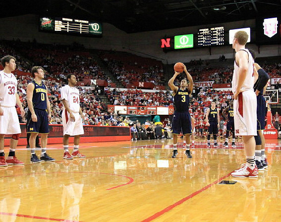 Zack Novak (0) and Trey Burke (3)