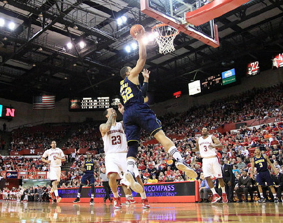 Tim Hardaway Jr. (10), Jordan Morgan (52), and Trey Burke (3)