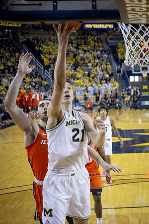 Franz Wagner (21) and Eli Brooks (55)