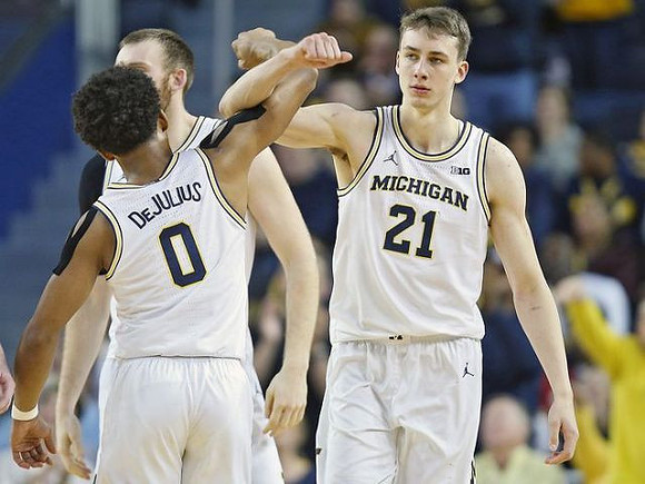 David DeJulius (0), Austin Davis (51), and Franz Wagner (21)