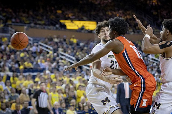 Brandon Johns Jr. (23) and David DeJulius (0)