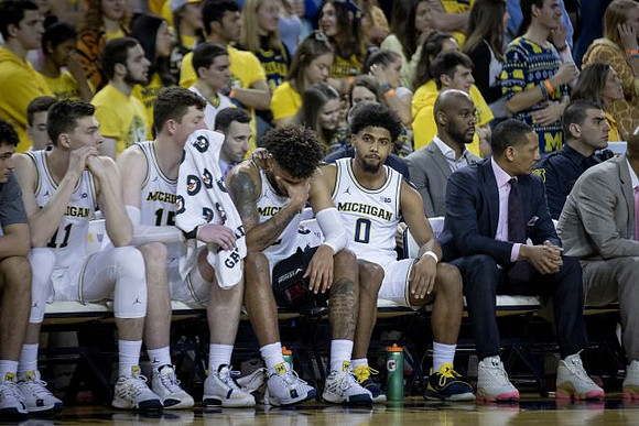 Colin Castleton (11), Jon Teske (15), Isaiah Livers (2), David DeJulius (0), and Howard Eisley