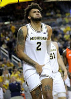 Isaiah Livers (2) and Austin Davis (51)