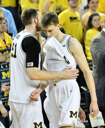 Austin Davis (51) and Franz Wagner (21)