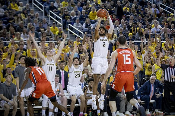Colin Castleton (11), Brandon Johns Jr. (23), and Isaiah Livers (2)
