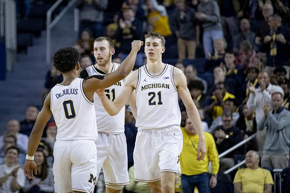 David DeJulius (0), Austin Davis (51), and Franz Wagner (21)