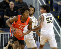 Zavier Simpson (3) and Eli Brooks (55)