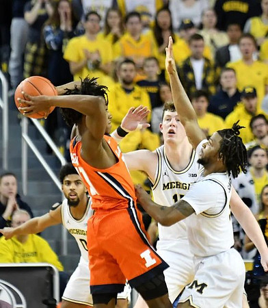 David DeJulius (0), Jon Teske (15), and Zavier Simpson (3)