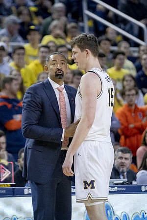 Juwan Howard and Jon Teske (15)