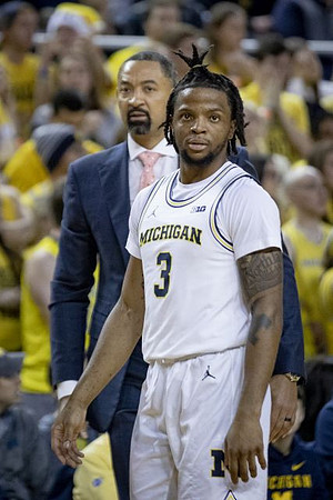Juwan Howard and Zavier Simpson (3)