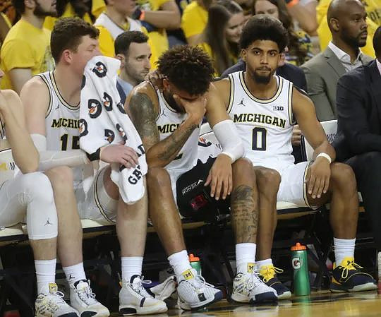 Jon Teske (15), Isaiah Livers (2), and David DeJulius (0)