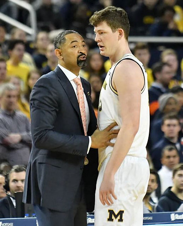 Juwan Howard and Jon Teske (15)