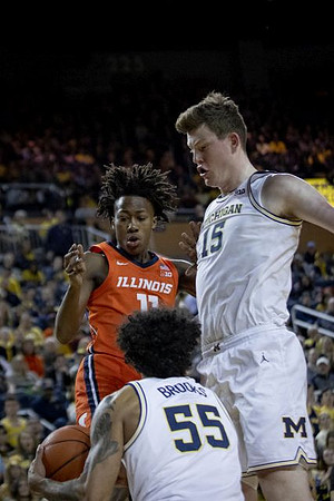Eli Brooks (55) and Jon Teske (15)