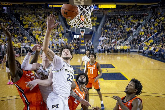 Brandon Johns Jr. (23) and Jon Teske (15)