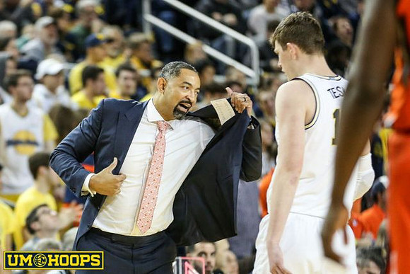 Juwan Howard and Jon Teske (15)