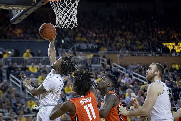 Zavier Simpson (3) and Austin Davis (51)
