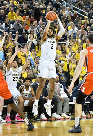 Isaiah Livers (2) and Brandon Johns Jr. (23)
